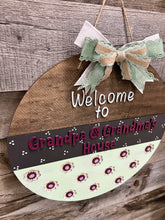 Load image into Gallery viewer, Welcome to Grandpa & Grandma’s house 16” Round flower Doorhanger