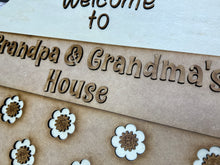 Load image into Gallery viewer, Welcome to Grandpa & Grandma’s house 16” Round flower Doorhanger