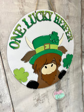 Load image into Gallery viewer, St. Patrick’s Day Doorhanger Round Lucky heifer