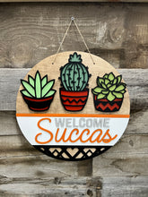 Load image into Gallery viewer, Welcome Succas 16” Round Doorhanger
