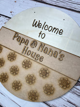 Load image into Gallery viewer, Welcome to Papa &amp; Nanas house 16” Round flower Doorhanger
